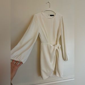 White cocktail/wedding dress. Changed into this dress for our wedding reception.